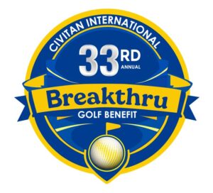 breakthru golf benefit logo, a blue circle with a gold banner in the middle and a golf ball with a tee on top at the bottom of the circle